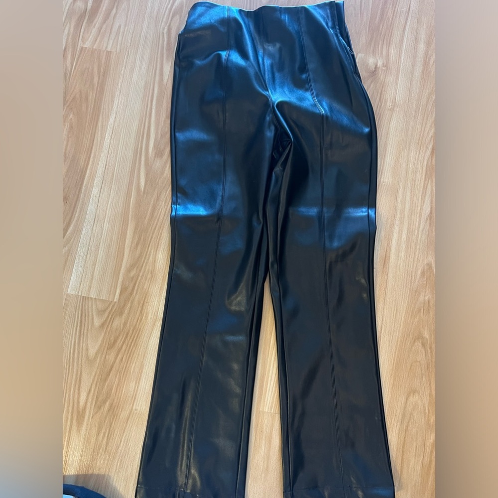 Women's black vegan leather straight pants. Never worn with tags